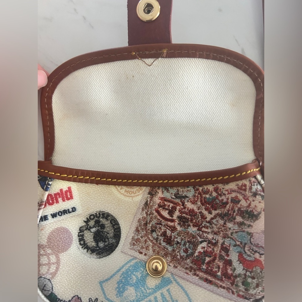 Dooney & Bourke Disney Parks Wristlet -Vintage Postcard Magic Kingdom Print- NWT - Picture 9 of 11